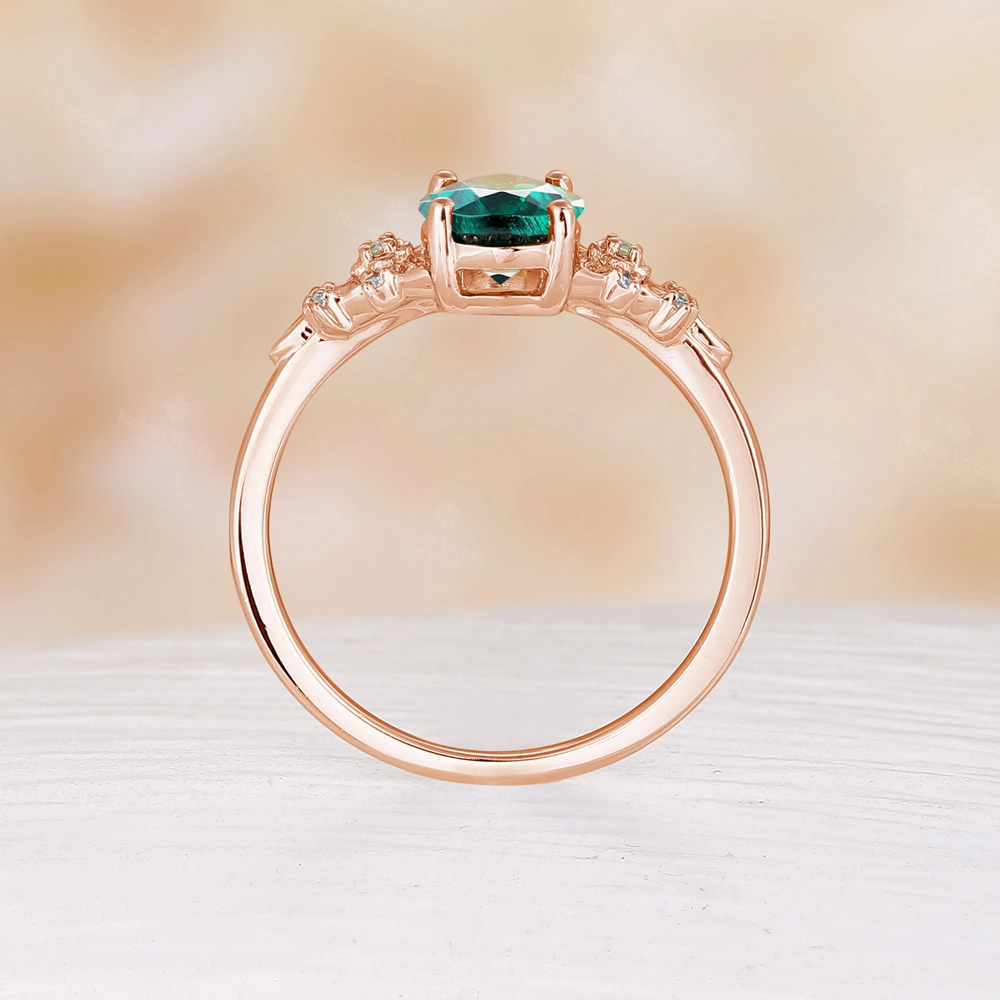 Nature Inspired Oval Cut Lab Emerald Foral Engagement Ring Rose Gold Side Stone