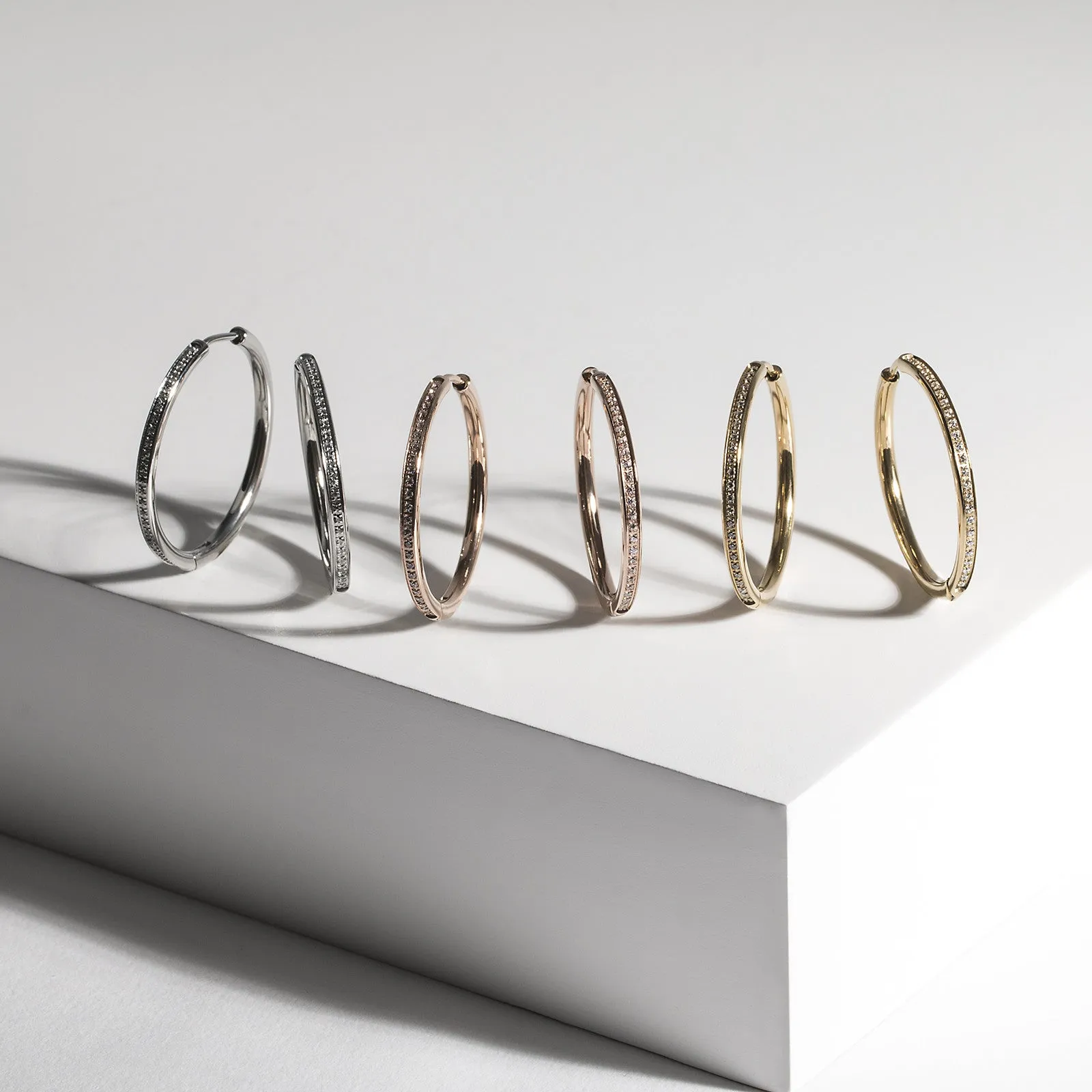 Stainless thin half eternity hoop earrings